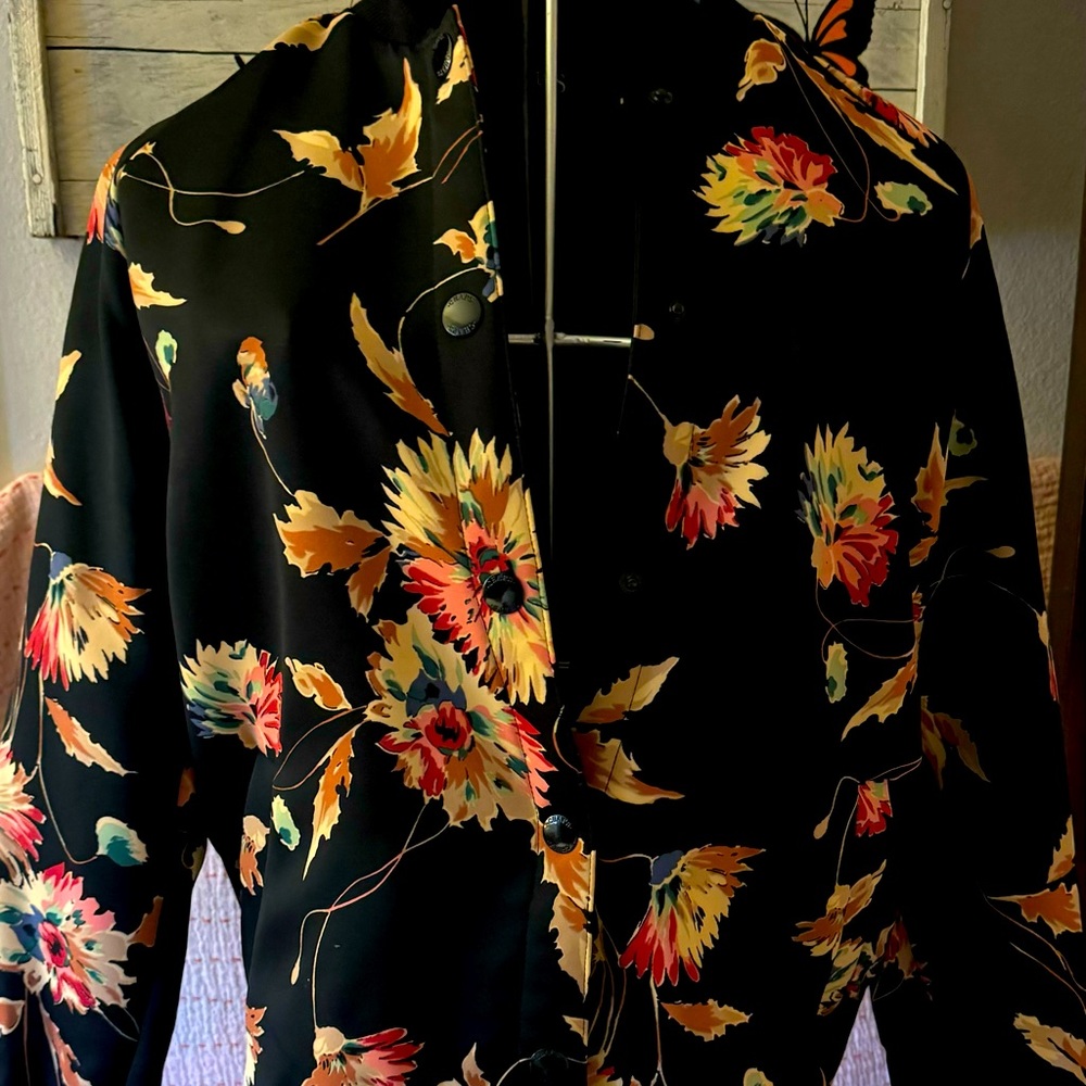 Floral zip up bomber style jacket.